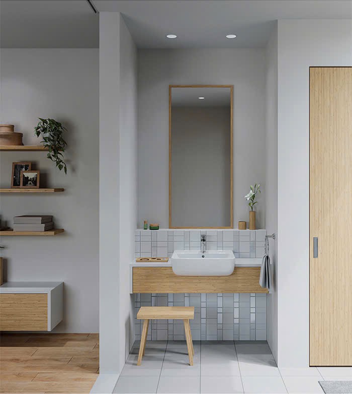 Gạch mosaic INAX màu trắng ốp tường khu vực bồn rửa mặt tạo điểm nhấn tinh tế.